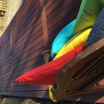 colourful pillows on a deck